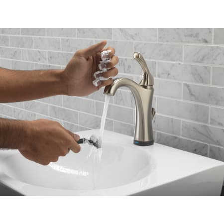 Delta-592T-DST-Running Faucet in Use in Brilliance Stainless