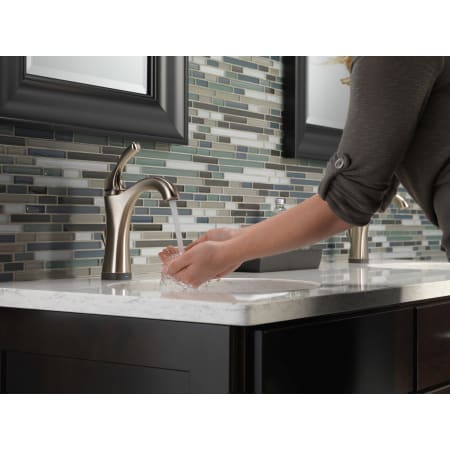 Delta-592T-DST-Running Faucet in Use in Brilliance Stainless