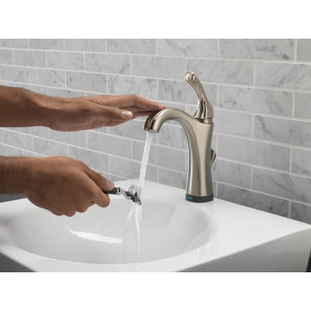 Delta-592T-DST-Running Faucet in Use in Brilliance Stainless