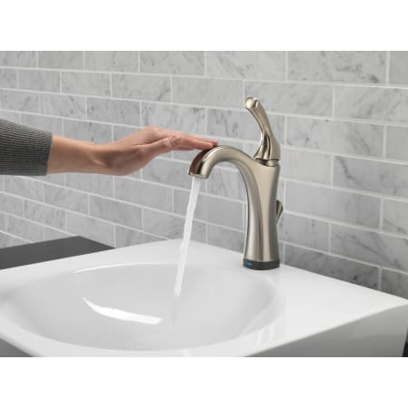 Delta-592T-DST-Running Faucet in Use in Brilliance Stainless