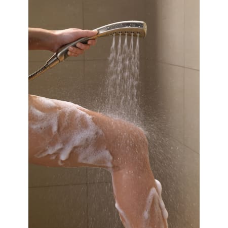 Delta-59411-PK-Handshower in Use in Brilliance Stainless