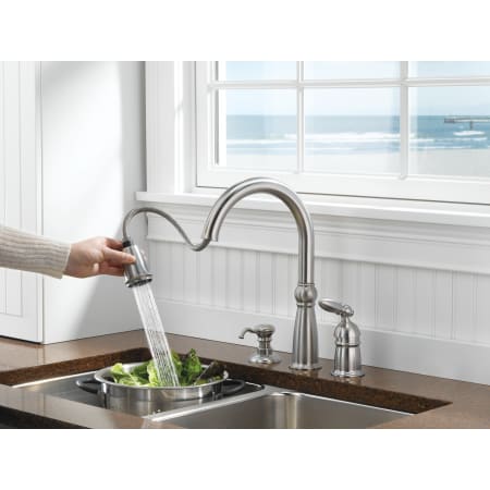 Delta-955-DST-Faucet in Use in Brilliance Stainless