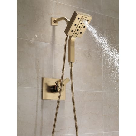 Delta-T17053-Running Handshower in Champagne Bronze