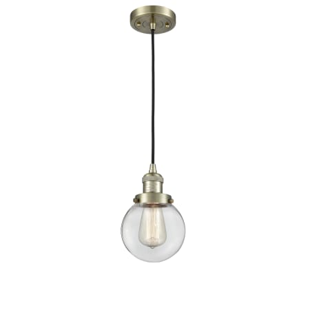 Innovations Lighting Beacon Single Light 6" Wide Mini Pendant with Adjustable Cord Antique Brass / Clear