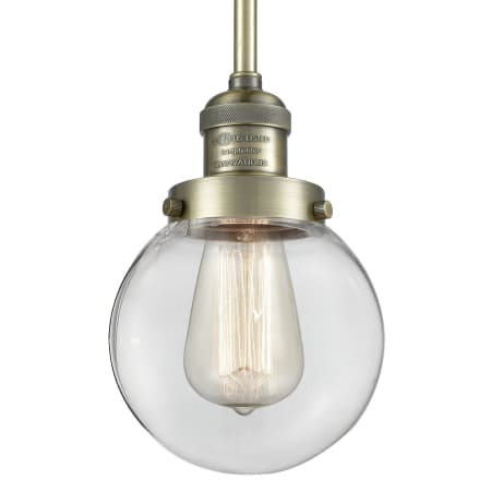 Innovations Lighting Beacon 6" Wide Mini Pendant Antique Brass / Clear