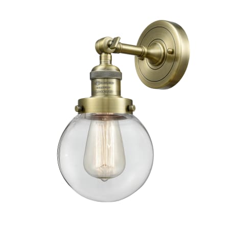 Innovations Lighting Beacon 12" Tall Bathroom Sconce Antique Brass / Clear