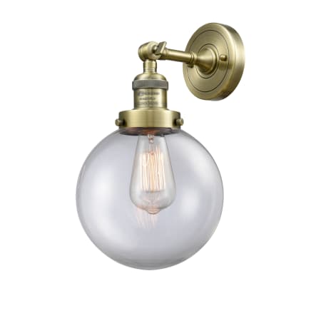 Innovations Lighting Beacon 14" Tall Bathroom Sconce Antique Brass / Clear