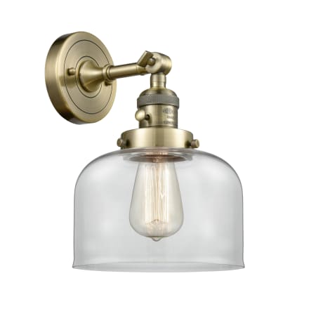Innovations Lighting Large Bell Single Light 12" Tall Bathroom Sconce with Multiple Shade Options Antique Brass / Clear
