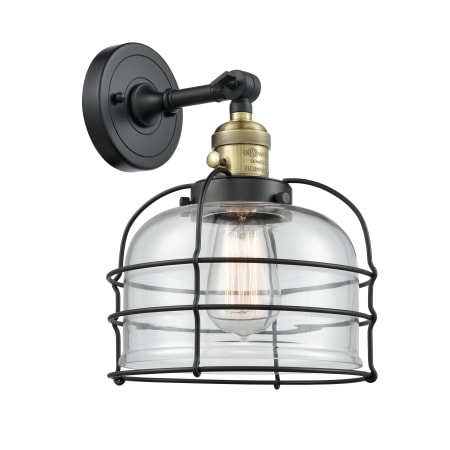 Innovations Lighting Large Bell Cage Single Light 12" Tall Bathroom Sconce - 3 Way Switch on Socket Black Antique Brass / Clear