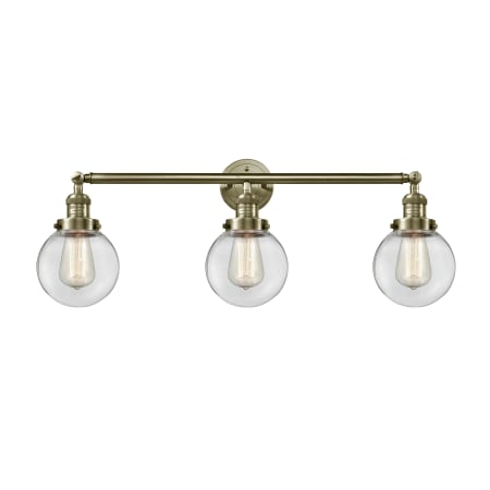 Innovations Lighting Beacon 3 Light 30" Wide Vanity Light Antique Brass / Clear