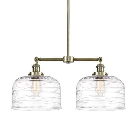 Innovations Lighting Bell 2 Light 21" Wide Linear Pendant Antique Brass / Clear Deco Swirl
