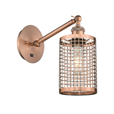 Innovations Lighting Nestbrook 12" Tall Wall Sconce Antique Copper
