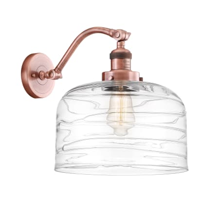 Innovations Lighting Bell 13" Tall Wall Sconce Antique Copper / Clear Deco Swirl