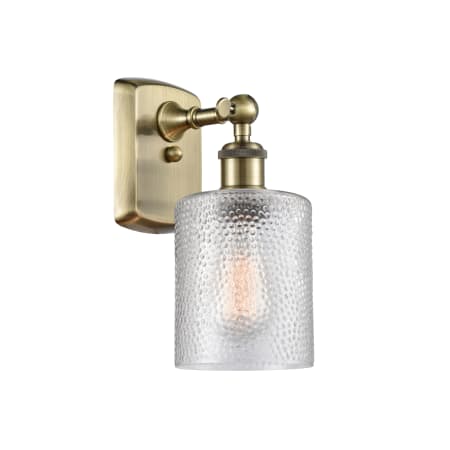 Innovations Lighting Cobbleskill 9" Tall Wall Sconce Antique Brass / Clear