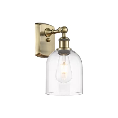 Innovations Lighting Bella 11" Tall Wall Sconce Antique Brass / Clear