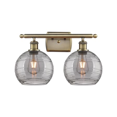 Innovations Lighting Athens Deco Swirl 2 Light 18" Wide Vanity Light Antique Brass / Light Smoke Deco Swirl