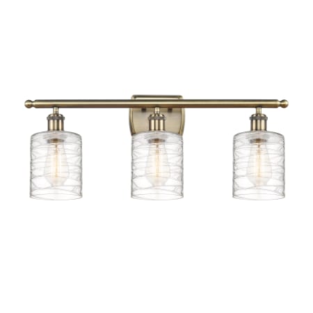 Innovations Lighting Cobbleskill 3 Light 26" Wide Vanity Light Antique Brass / Deco Swirl