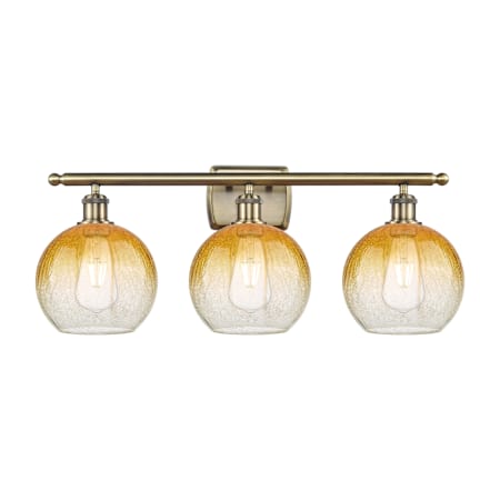 Innovations Lighting Brookhaven Globe 3 Light 28" Wide Vanity Light Antique Brass / Amber