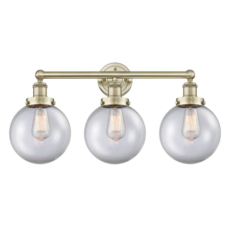 Innovations Lighting Beacon 3 Light 25" Wide Vanity Light Antique Brass / Clear
