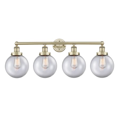 Innovations Lighting Beacon 4 Light 34" Wide Vanity Light Antique Brass / Clear
