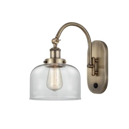 Innovations Lighting Bell 13" Tall Wall Sconce with Bell Shade Antique Brass / Clear