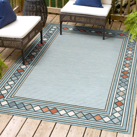 JONATHAN Y Lighting Hawaii 7-3/4' x 10' Polypropylene Geometric, Striped, and Traditional Indoor/Outdoor Area Rug Blue / Ivory