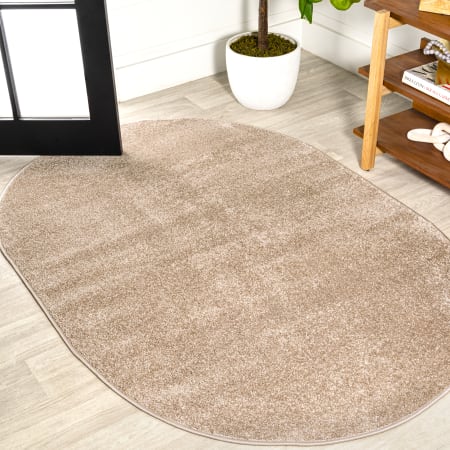 JONATHAN Y Lighting Supersoft 5' x 8' Polypropylene Solid Indoor Oval Area Rug Beige