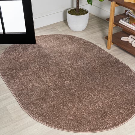JONATHAN Y Lighting Supersoft 5' x 8' Polypropylene Solid Indoor Oval Area Rug Brown
