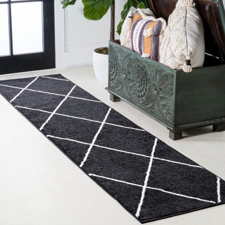 JONATHAN Y Lighting Supersoft 2' x 10' Polypropylene Geometric Rectangle Area Rug Black / White