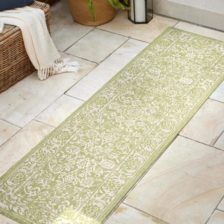 JONATHAN Y Lighting 2' x 10' Polypropylene Bohemian Indoor/Outdoor Rectangular Area Rug Green / Cream