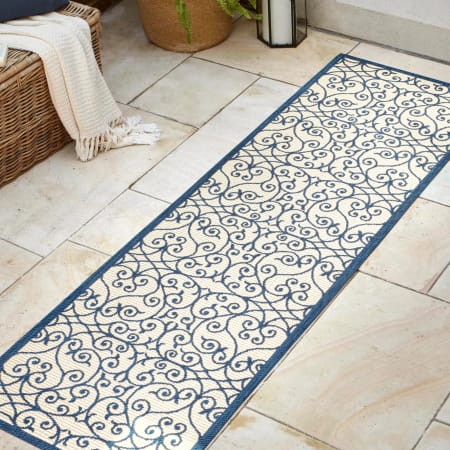 JONATHAN Y Lighting 2' x 10' Polypropylene Vintage Indoor/Outdoor Rectangular Area Rug Navy / Beige