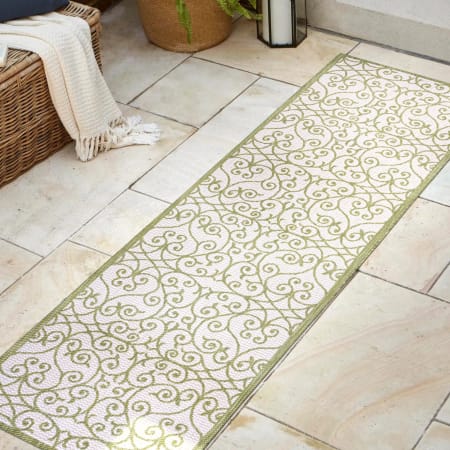 JONATHAN Y Lighting 2' x 8' Polypropylene Vintage Indoor/Outdoor Rectangular Area Rug Green / Cream