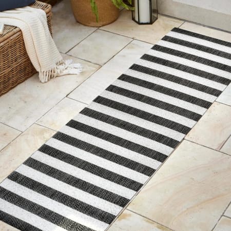 JONATHAN Y Lighting 2' x 8' Polypropylene Striped Indoor/Outdoor Rectangular Area Rug Black / Cream