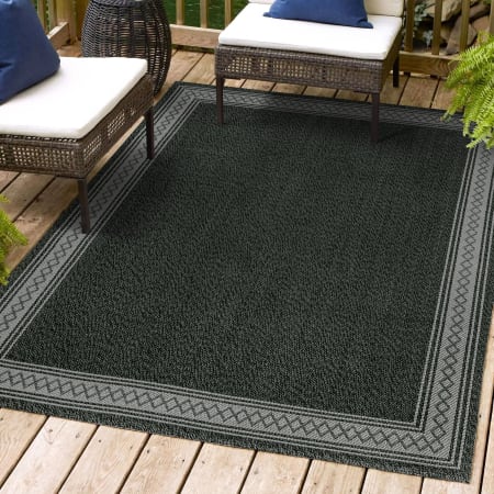 JONATHAN Y Lighting Santa Monica 7-3/4' x 10' Polypropylene Border, Geometric, and Solid Indoor/Outdoor Rectangular Area Rug Black / Gray