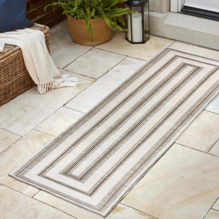 JONATHAN Y Lighting Savannah 2' x 8' Polypropylene Border and Striped Indoor/Outdoor Runner Area Rug Black / Cream