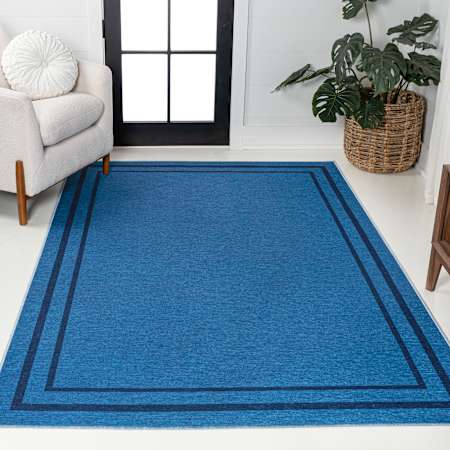 JONATHAN Y Lighting Washable 5-1/4' x 7-1/2' Chenille Border, Solid, Traditional, and Transitional Indoor Rectangular Area Rug Blue / Navy