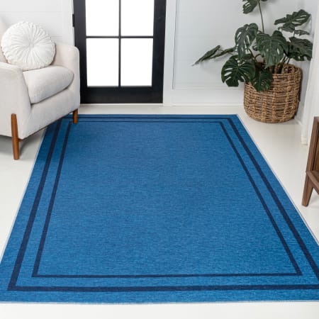 JONATHAN Y Lighting Washable 8-3/4' x 12' Chenille Border, Solid, Traditional, and Transitional Indoor Rectangular Area Rug Blue / Navy