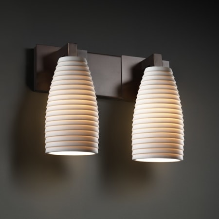 Dark Bronze finish with (-28) Tall Tapered Cylinder and Sawtooth shade option