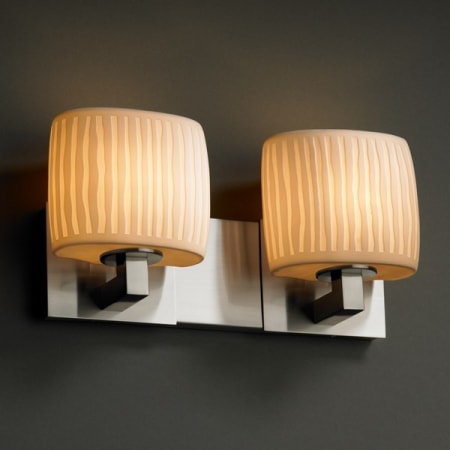 Brushed Nickel finish with (-30) Oval and Waterfall shade option