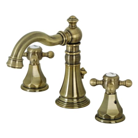 Kingston Brass Metropolitan 1.2 GPM Deck Mounted Widespread Bathroom Faucet with Pop-Up Drain Assembly Antique Brass