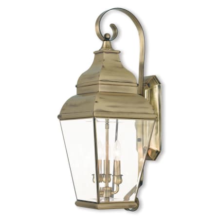 Livex Lighting Exeter 3 Light 28" Tall Outdoor Wall Sconce with Clear Glass Shade Antique Brass