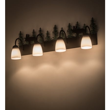 Meyda Tiffany Wandering Moose 4 Light 35" Wide Vanity Light Green