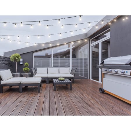 String lights hung in backyard over deck