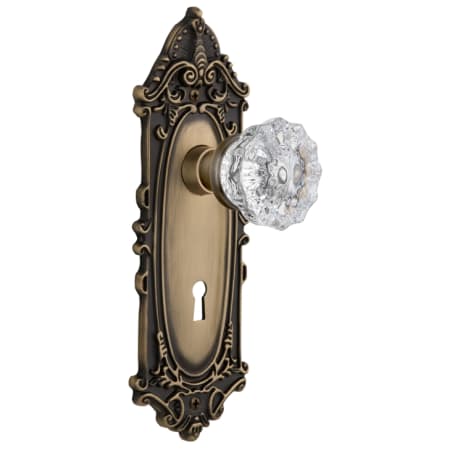 Nostalgic Warehouse Crystal Solid Brass Passage Door Knob Set with Victorian Rose, Keyhole and 2-3/8" Backset Antique Brass
