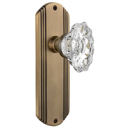 Nostalgic Warehouse Vintage Chateau Fluted Crystal Passage Door Knob Set with Solid Brass Art Deco Plate and 2-3/8" Backset Antique Brass
