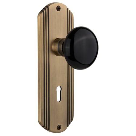 Nostalgic Warehouse Vintage Black Porcelain Vintage Skeleton Key Retrofit Entry Handleset Trim with Solid Brass Art Deco Plate, Keyhole and 2-1/4" Backset Antique Brass