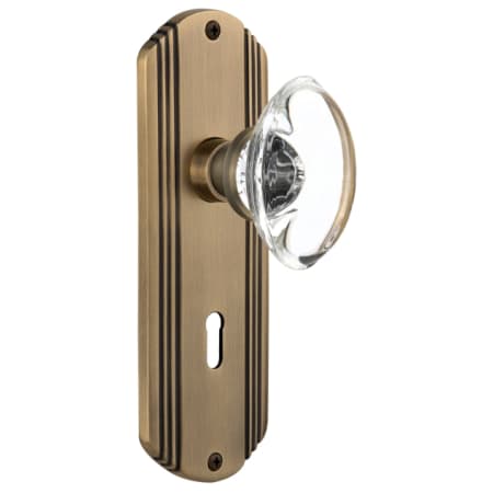 Nostalgic Warehouse Vintage Oval Egg Smooth Crystal Dummy Door Knob Set with Art Deco Plate and Keyhole Antique Brass