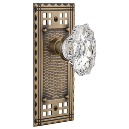 Nostalgic Warehouse Vintage Chateau Fluted Crystal Passage Door Knob Set with Solid Brass Long Craftsman Plate and 2-3/4" Backset Antique Brass