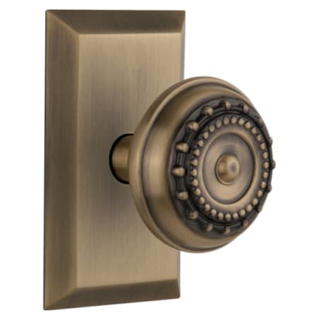 Nostalgic Warehouse Meadows Solid Brass Passage Door Knob Set with Studio Rose and 2-3/4" Backset Antique Brass