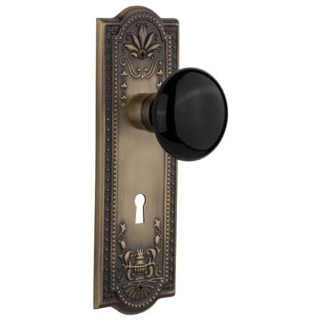 Nostalgic Warehouse Black Porcelain Solid Brass Single Dummy Door Knob with Meadows Rose and Keyhole Antique Brass